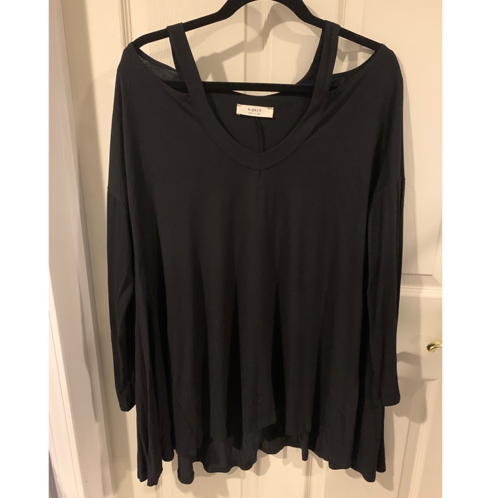 3x black tunic with cut out shoulders